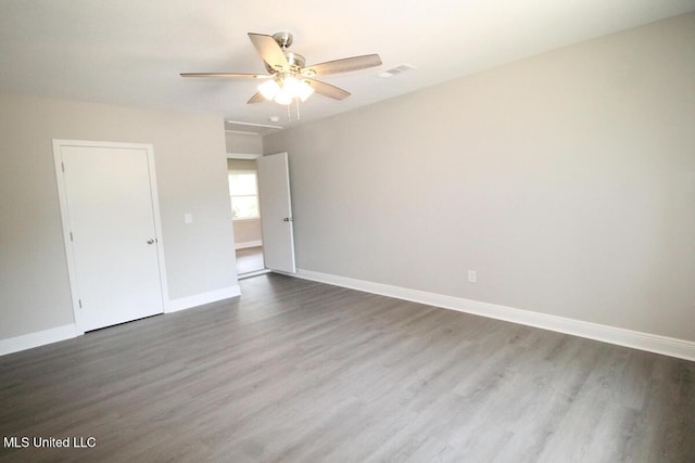 136 Childress Rd, Lucedale, MS 39452 - spare room featuring wood finished floors, a ceiling fan, and baseboards