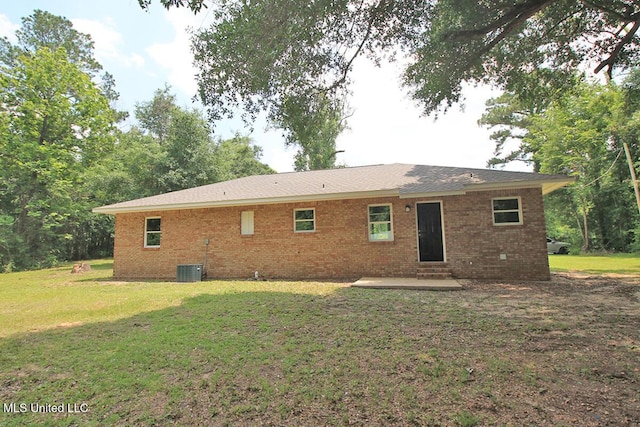 136 Childress Rd, Lucedale, MS 39452 - back of property with a yard, brick siding, a patio area, and entry steps
