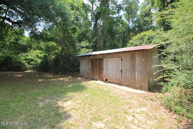 136 Childress Rd, Lucedale, MS 39452 - view of outbuilding featuring a forest view