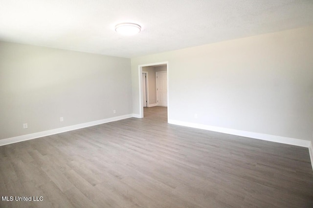 136 Childress Rd, Lucedale, MS 39452 - spare room featuring wood finished floors and baseboards
