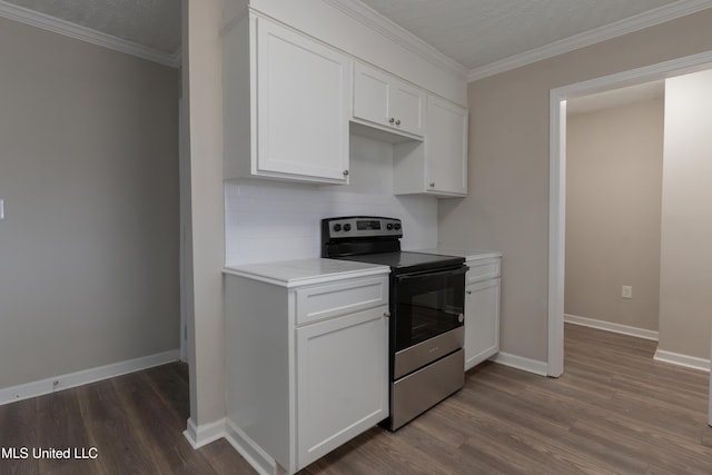 kitchen featuring light countertops, electric range, tasteful backsplash, and dark wood-style flooring