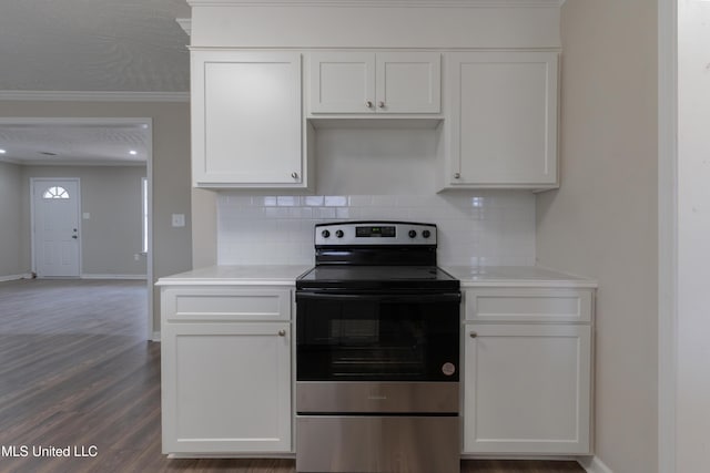 kitchen featuring light countertops, white cabinets, electric stove, crown molding, and tasteful backsplash