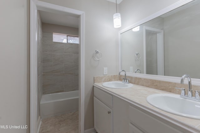 bathroom with double vanity and a sink