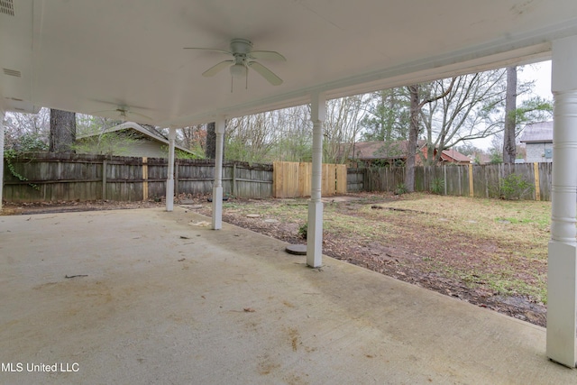 view of patio / terrace featuring a ceiling fan and fence