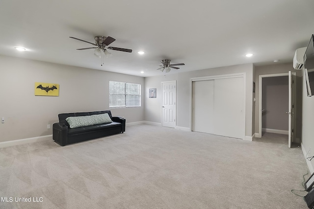 unfurnished room featuring light carpet and ceiling fan