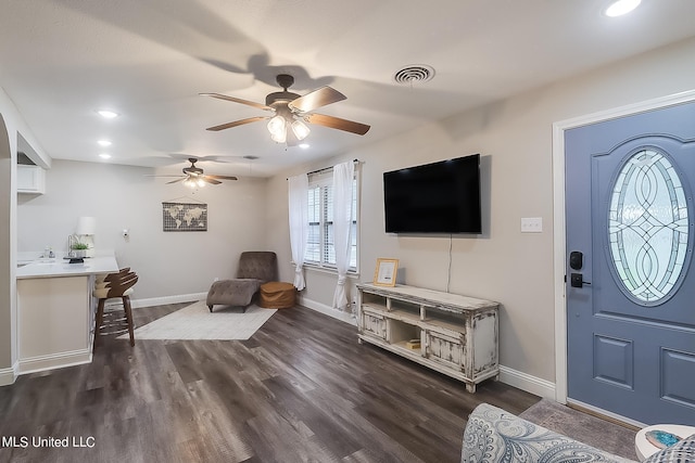 foyer featuring dark hardwood / wood-style floors and ceiling fan