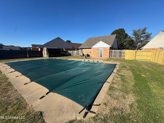9193 S Kaitlyn Dr, Walls, MS 38680 - view of pool featuring a yard, a fenced in pool, a gate, and a fenced backyard