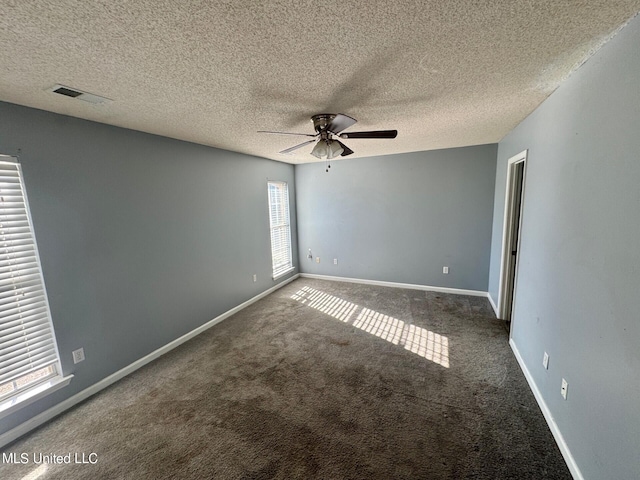 9193 S Kaitlyn Dr, Walls, MS 38680 - empty room featuring a ceiling fan, baseboards, visible vents, and carpet