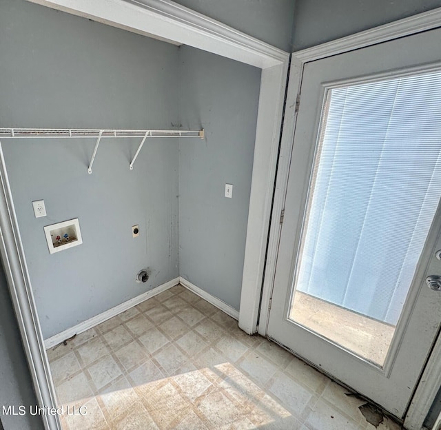 9193 S Kaitlyn Dr, Walls, MS 38680 - laundry area with plenty of natural light, washer hookup, hookup for an electric dryer, and light floors
