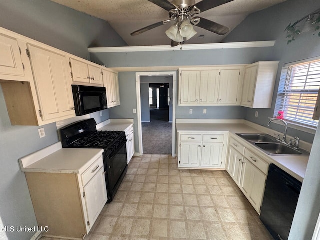 9193 S Kaitlyn Dr, Walls, MS 38680 - kitchen with a ceiling fan, lofted ceiling, light countertops, a sink, and black appliances