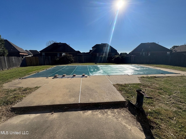 9193 S Kaitlyn Dr, Walls, MS 38680 - view of swimming pool featuring a lawn, a fenced in pool, a fenced backyard, and a patio area