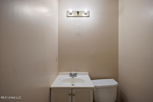 791 Leach St, Yazoo City, MS 39194 - half bathroom with toilet and vanity