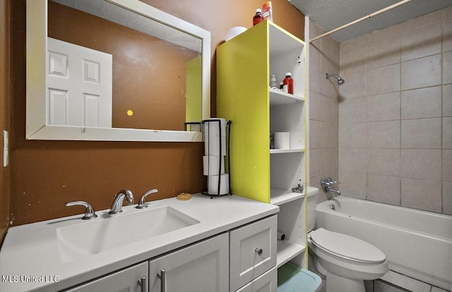 791 Leach St, Yazoo City, MS 39194 - full bathroom featuring toilet, shower / bath combination, vanity, and tile patterned flooring