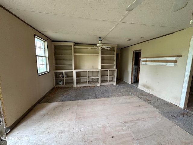 interior space featuring ceiling fan