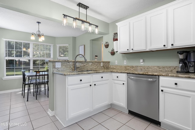 kitchen with dishwasher, a notable chandelier, pendant lighting, sink, and white cabinetry