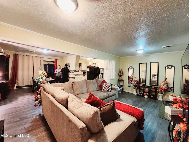 living room with a textured ceiling, dark hardwood / wood-style floors, and crown molding