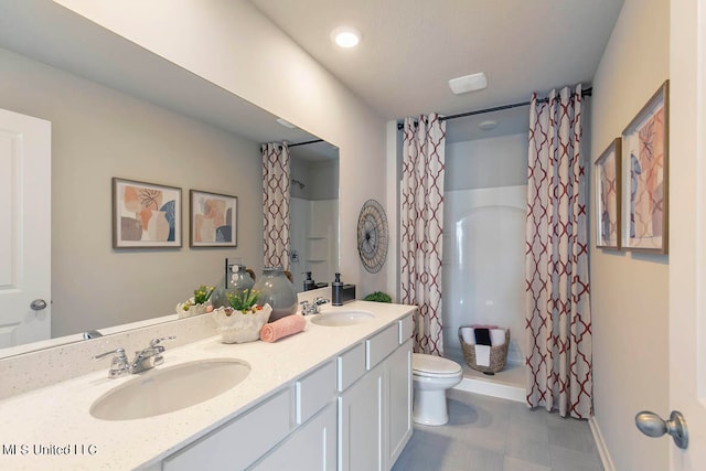 bathroom with vanity, toilet, and a shower with curtain