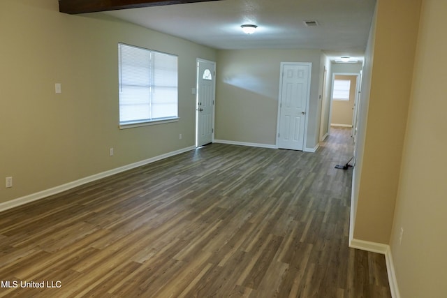 interior space with dark wood-type flooring