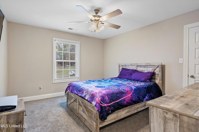 carpeted bedroom with ceiling fan