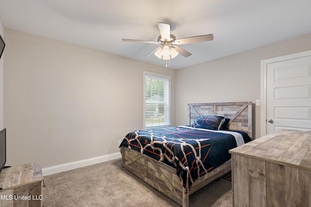 bedroom featuring ceiling fan and light colored carpet