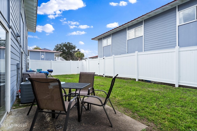 1664 Beach Blvd Unit 90, Biloxi, MS 39531 - view of patio / terrace featuring cooling unit and outdoor dining area