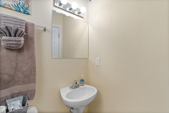 1664 Beach Blvd Unit 90, Biloxi, MS 39531 - half bath with a sink
