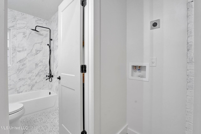 bathroom with toilet and tub / shower combination