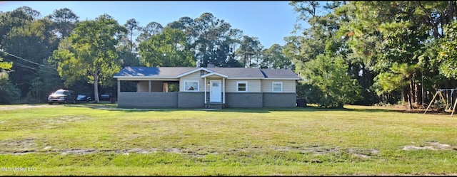 single story home with brick siding and a front yard