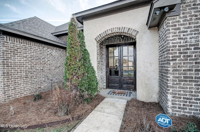 doorway to property with french doors