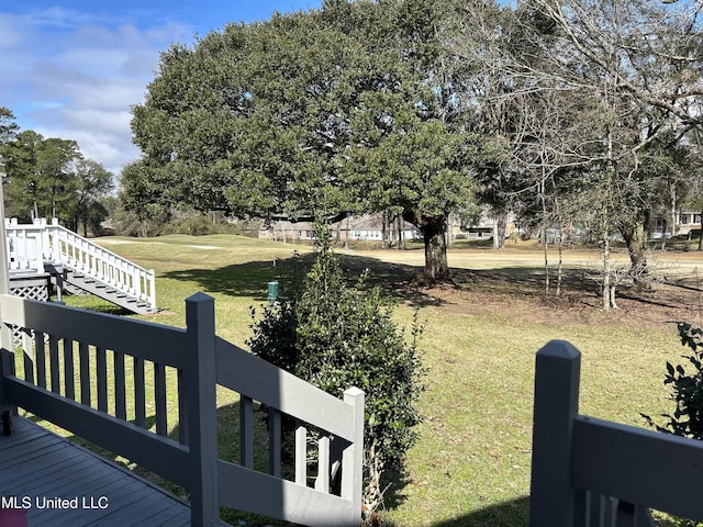 view of yard featuring stairway