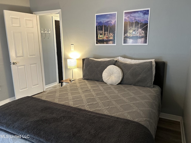 bedroom featuring baseboards