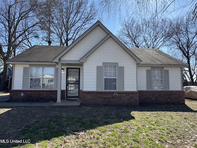 view of front of home with brick siding