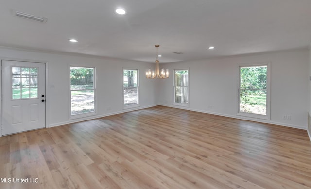 551 Holly Bush Rd, Brandon, MS 39047 - unfurnished dining area with a chandelier, healthy amount of natural light, baseboards, recessed lighting, and crown molding