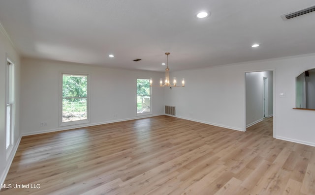 551 Holly Bush Rd, Brandon, MS 39047 - unfurnished room with a chandelier, baseboards, ornamental molding, recessed lighting, and light wood finished floors