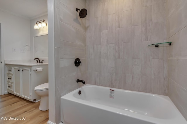 551 Holly Bush Rd, Brandon, MS 39047 - full bathroom featuring wood finished floors, toilet, vanity, ornamental molding, and bathing tub / shower combination
