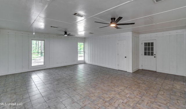 551 Holly Bush Rd, Brandon, MS 39047 - spare room with ceiling fan, healthy amount of natural light, and a decorative wall