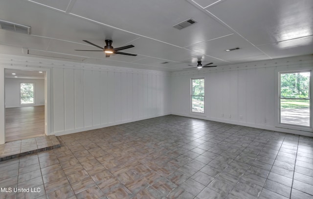 551 Holly Bush Rd, Brandon, MS 39047 - empty room featuring a ceiling fan, plenty of natural light, and baseboards