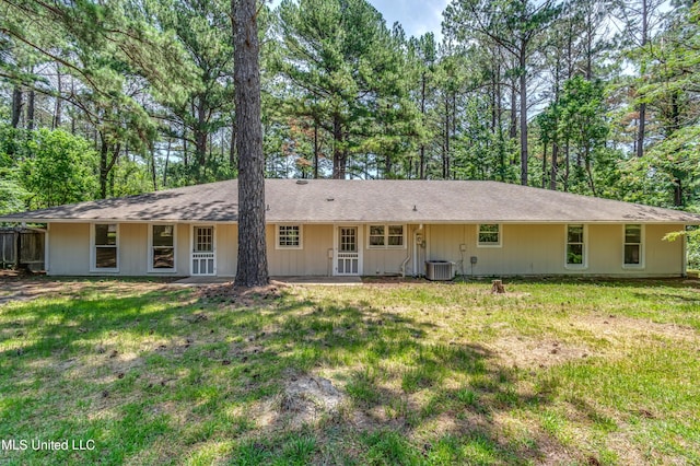 551 Holly Bush Rd, Brandon, MS 39047 - rear view of property with a lawn and central air condition unit