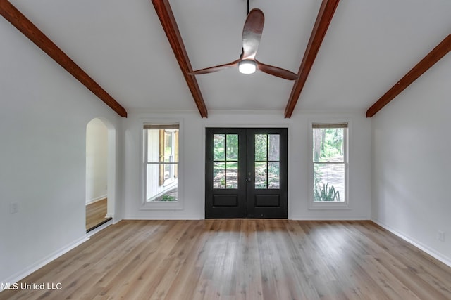 551 Holly Bush Rd, Brandon, MS 39047 - foyer entrance with french doors, wood finished floors, ceiling fan, arched walkways, and baseboards