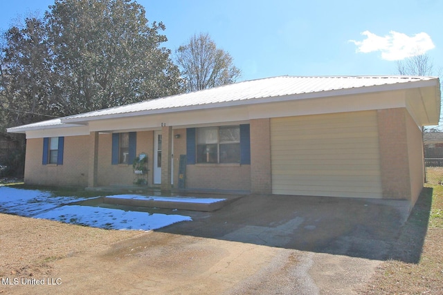 single story home with a carport and covered porch