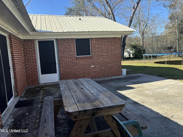 view of patio with a trampoline