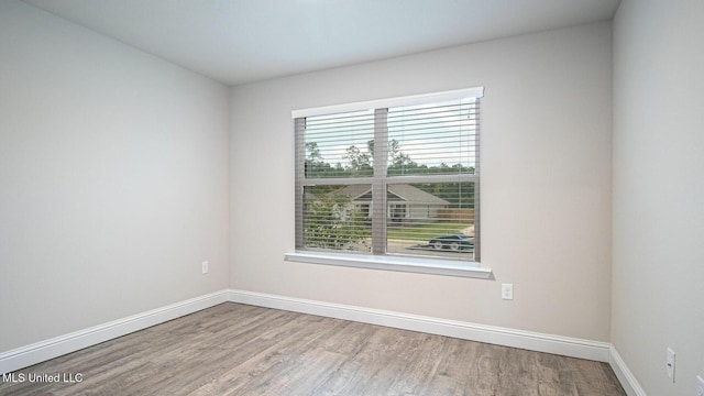 32 Crown Dr, Lucedale, MS 39452 - spare room with wood finished floors and baseboards