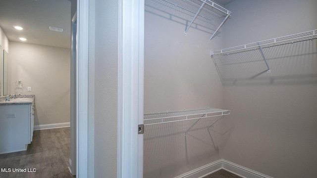 32 Crown Dr, Lucedale, MS 39452 - walk in closet featuring dark wood-type flooring