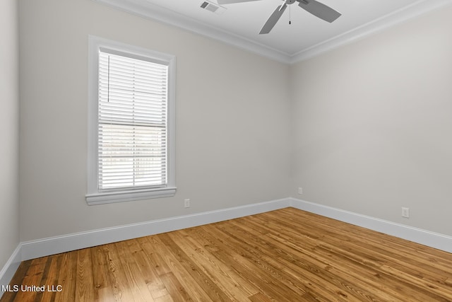 unfurnished room featuring ceiling fan, crown molding, and hardwood / wood-style floors