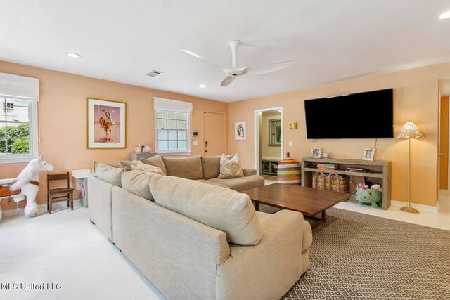 living room featuring ceiling fan