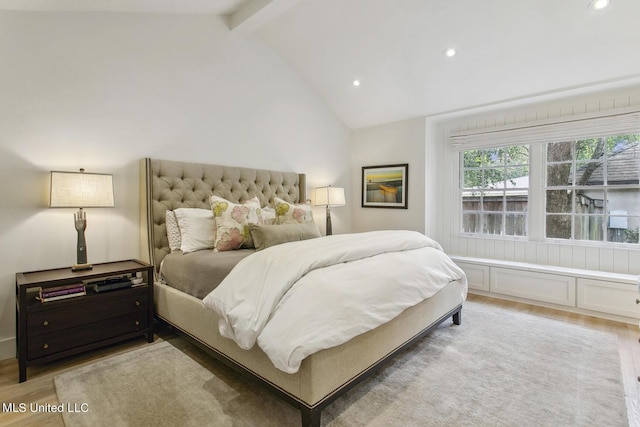 bedroom featuring light wood finished floors, lofted ceiling with beams, and recessed lighting