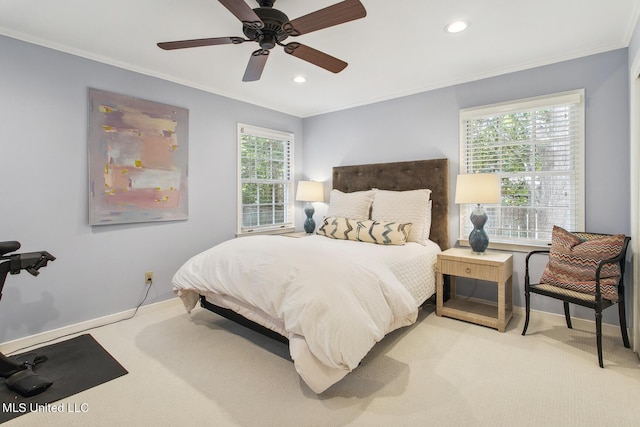 carpeted bedroom featuring ornamental molding, baseboards, and recessed lighting