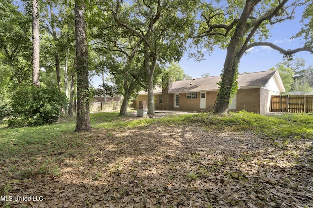view of yard featuring fence