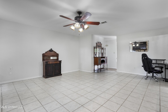 living area with a ceiling fan, baseboards, visible vents, and light tile patterned flooring
