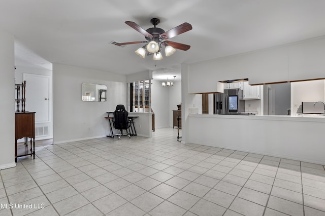 living area featuring baseboards, ceiling fan with notable chandelier, light tile patterned floors, and visible vents